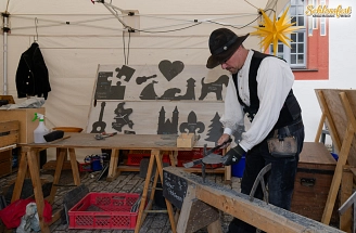 Händler mit Schieferkunst
